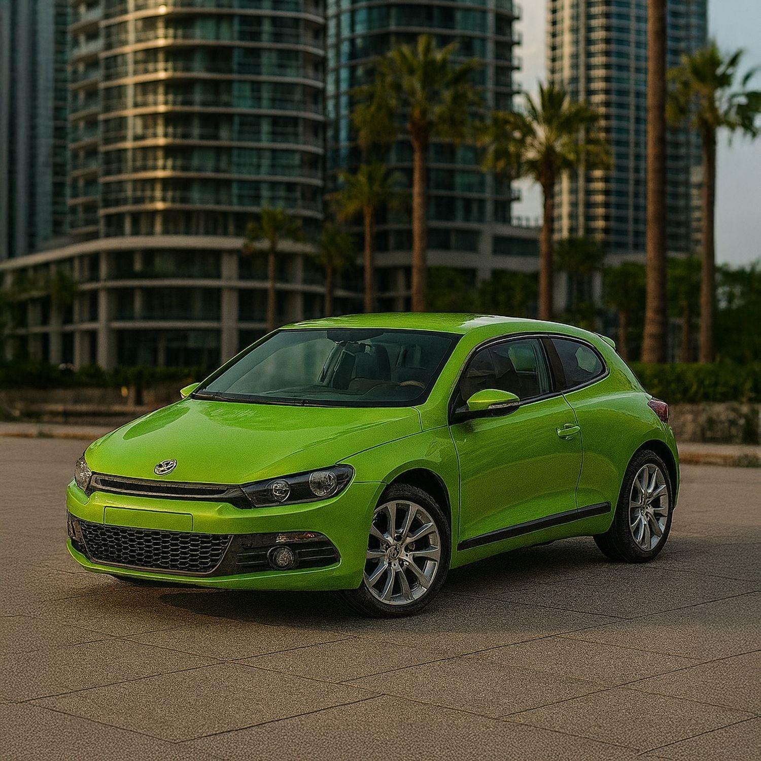 AUTO DE METAL VOLKSWAGEN SCIROCCO A ESCALA 1:43 WELLY - 2