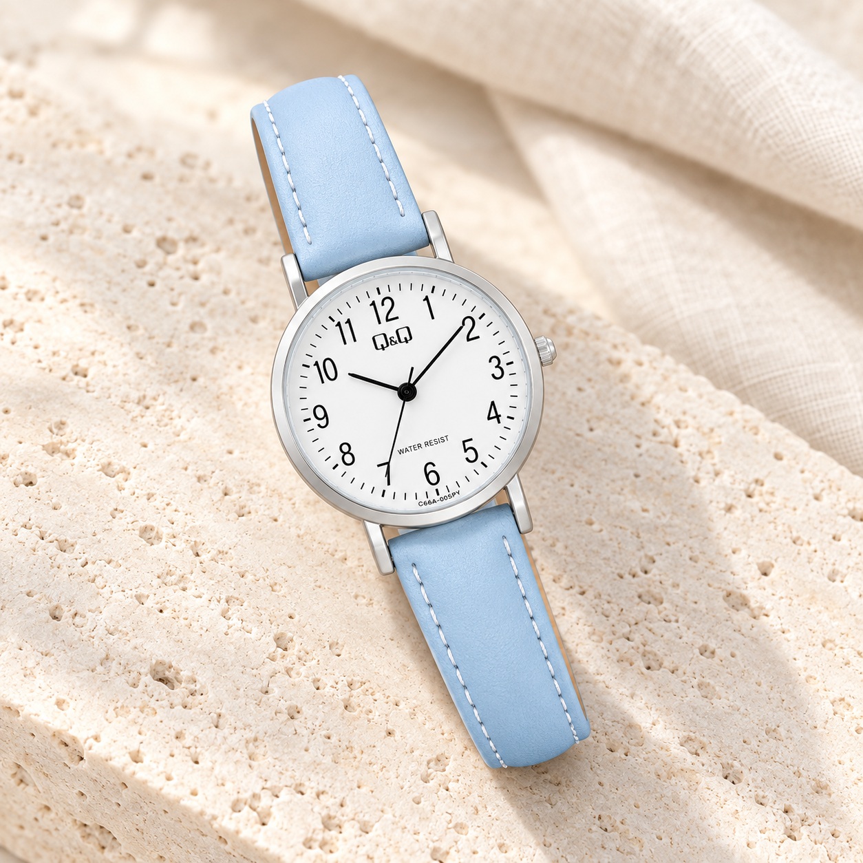 RELOJ QYQ C66A-005PY PARA MUJER COLOR CELESTE CORREA SINTÉTICA ESFERA BLANCA 28 MM 3 BAR - 5