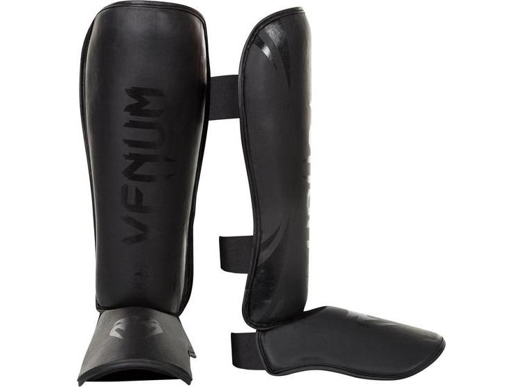 ESPINILLERAS VENUM ELITE DE VENUM PARA MUAY THAI CON PIEL SKINTEX Y ESPUMA DE ALTA DENSIDAD, DISEÑO PREMIUM - 1