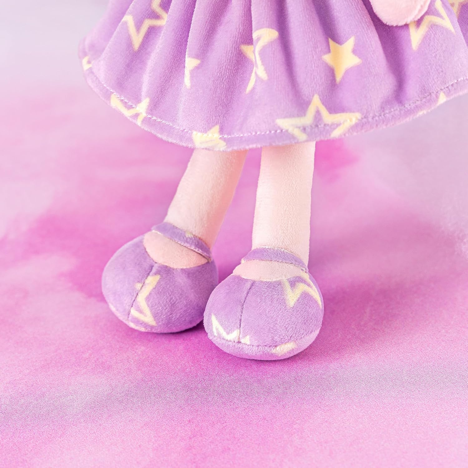 MUÑECA GLOVELEYA BEBÉ SUAVE SERIE GALAXY VESTIDO PÚRPURA CON ESTRELLAS 12 PULGADAS - 5