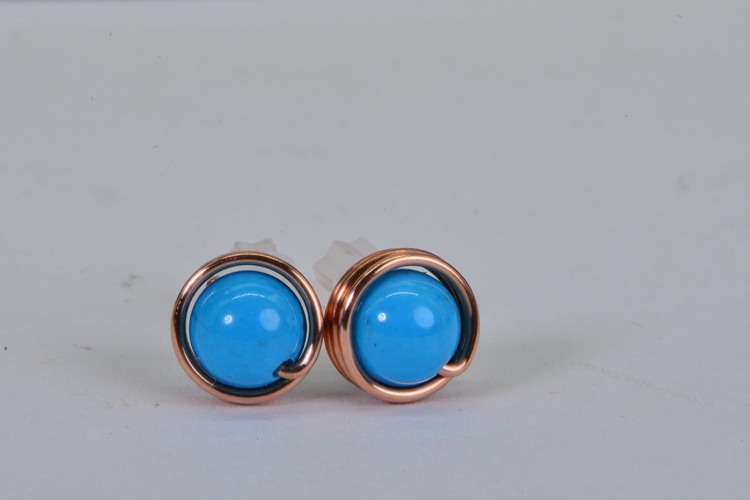 ARETES DE PIEDRA DE LUNA NATURAL ENVUELTOS EN COBRE 6MM - 2