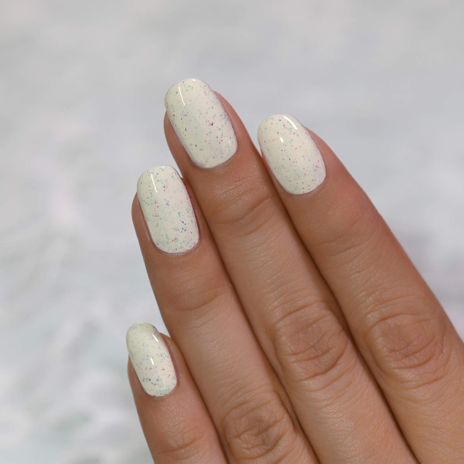 ESMALTE DE UÑAS ILNP CAKE POP CREMA VINTAGE MARFIL JASPEADO - 5