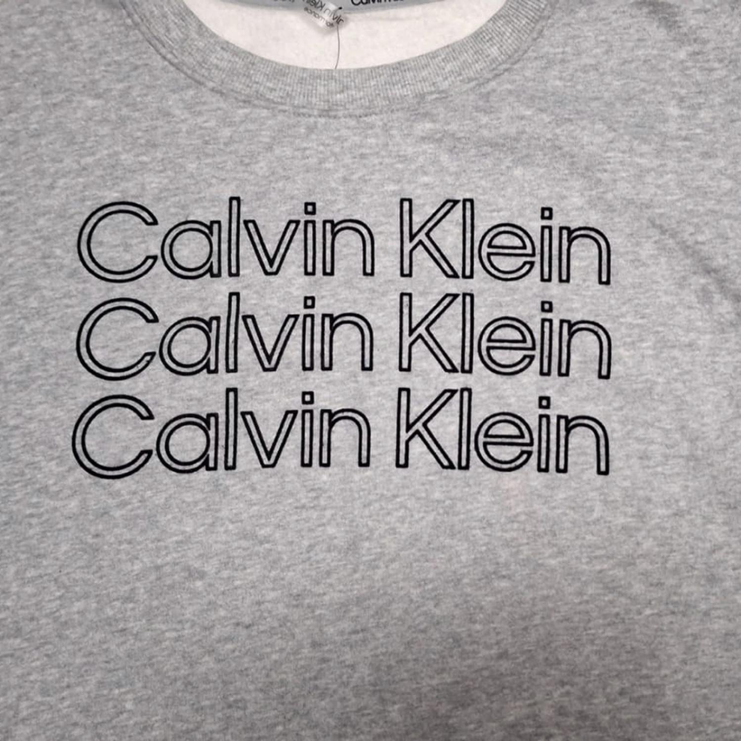 POLERA MUJER CALVIN KLEIN PERFORMANCE GRIS - 2