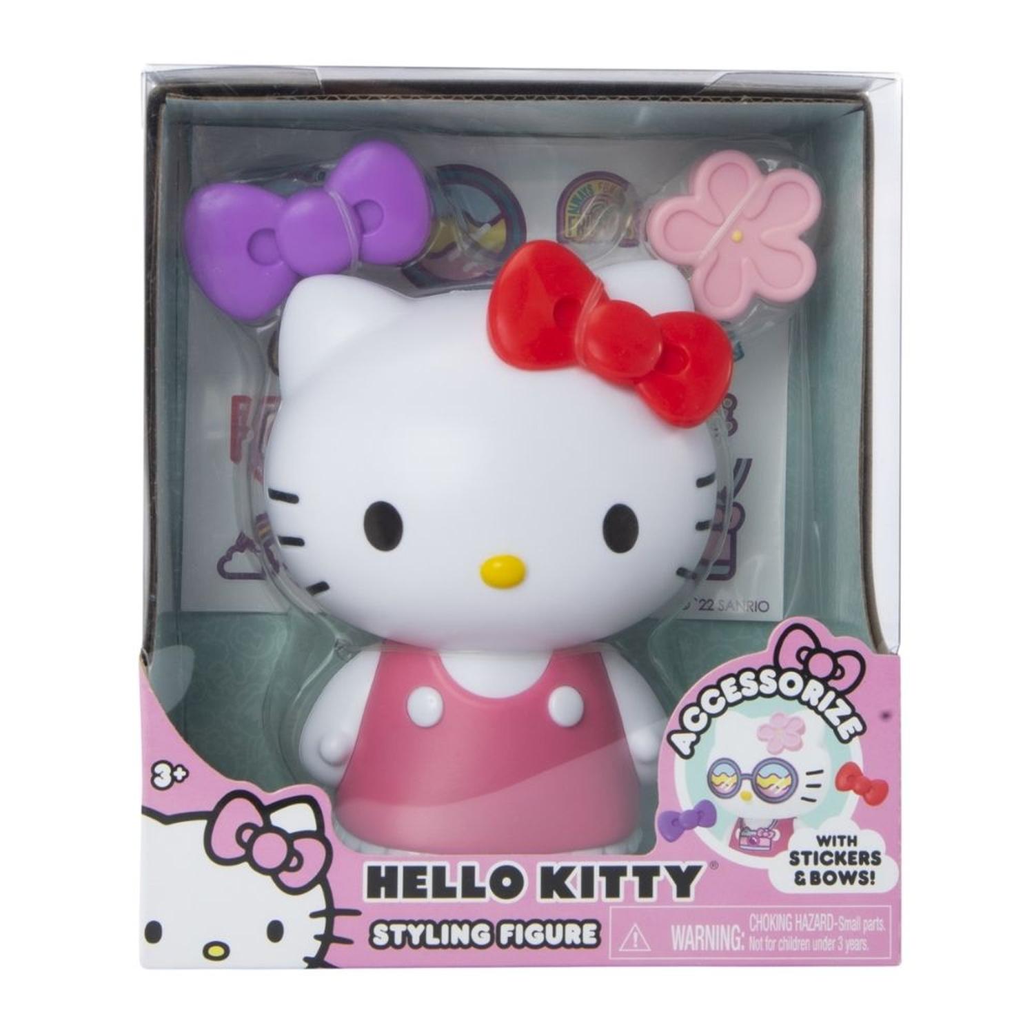 FIGURA DE HELLO KITTY CON MOÑOS INTERCAMBIABLES Y STICKERS - 1