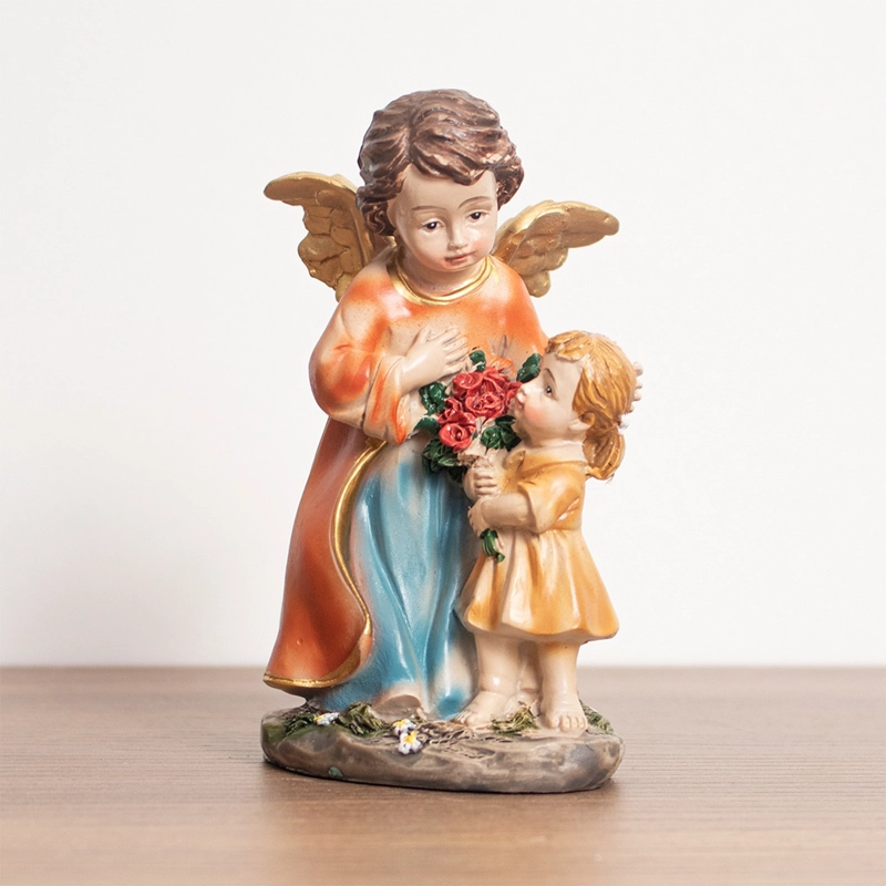 ANGEL CON NIÑA POLIRESINA - 2