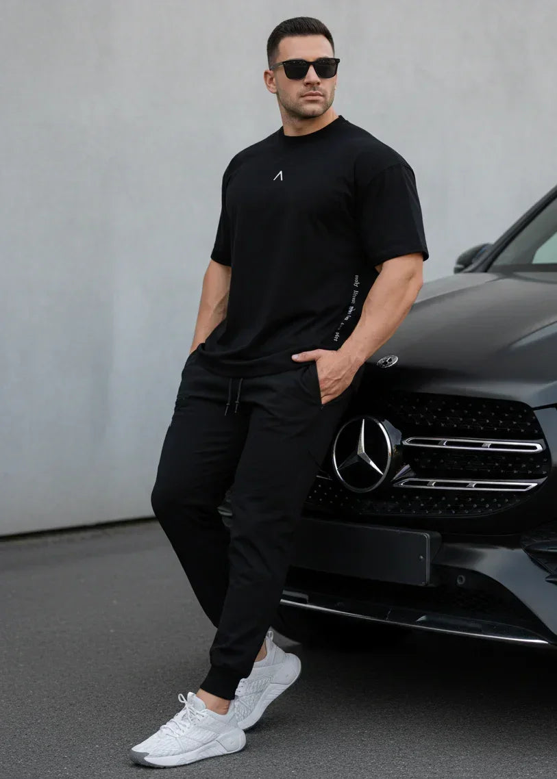 POLO DEPORTIVO HOMBRE OVERSIZE NEGRO - 6