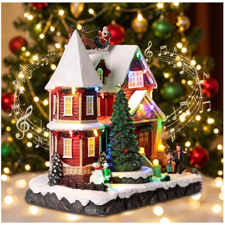 VILLA NAVIDEÑA ILUMINADA ÁRBOL GIRATORIO LUCES LED Y MÚSICA 25CM - 1