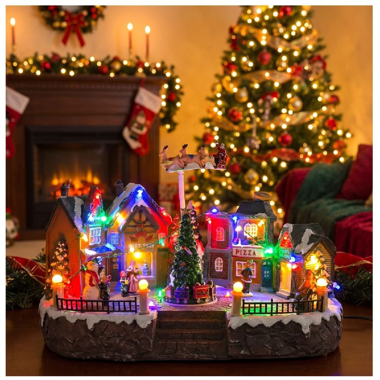 VILLA NAVIDEÑA ANIMADA CON LUCES LED Y MÚSICA PAPÁ NOEL EN TRINEO GIRATORIO - 1