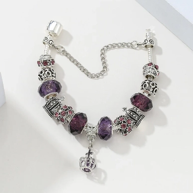 PULSERA CON CHARMS CORONA MORADO - 19CM - 1