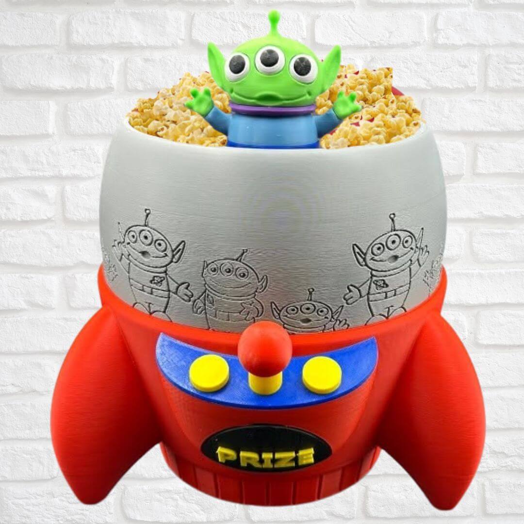 PALOMERA COHETE ALIENS TOY STORY POPCORN PELUCHE - MIDE 24 CM ALTO - 1