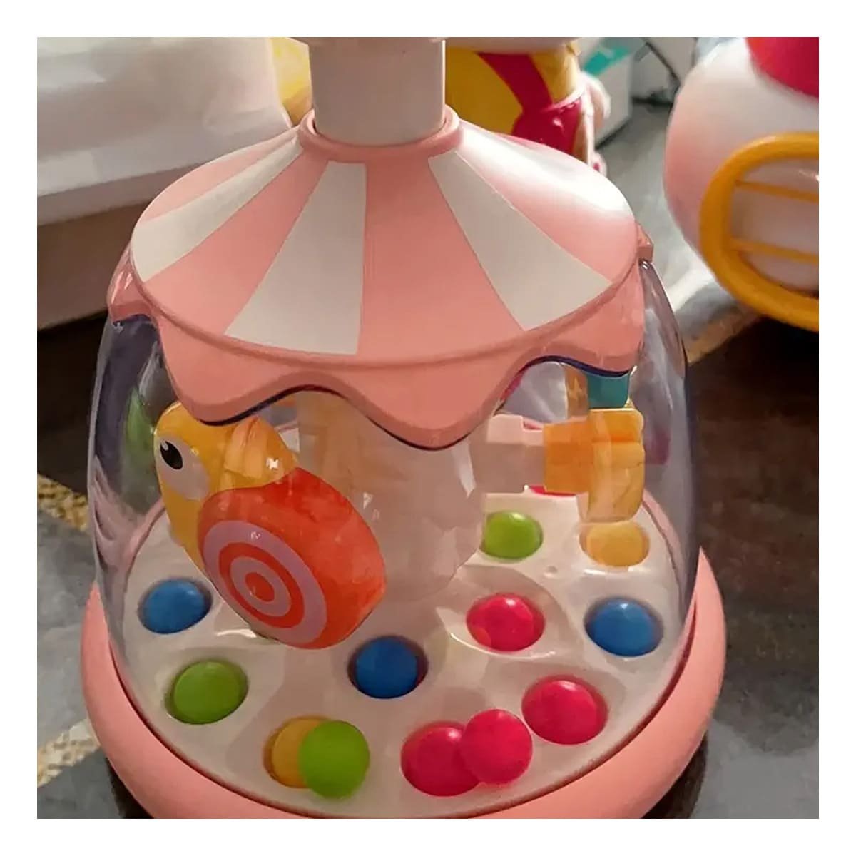 GIRADOR DE PECES ROSADO GIRATORIO PARA NINOS EN JARDIN DE LA FAMILIA - 1