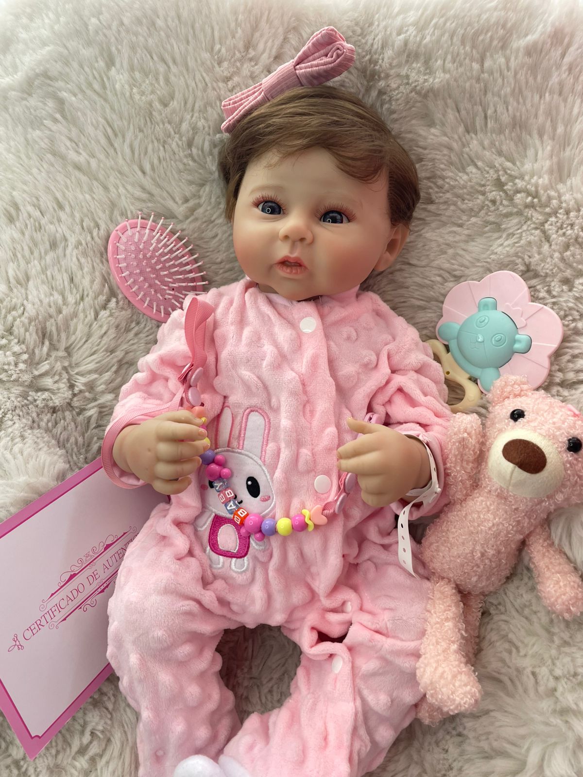 MUÑECA  REALISTA CON ACCESORIOS - 2