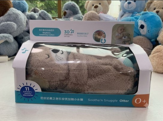 PELUCHE NUTRIA RELAJANTE ESPANTA CUCO CON RESPIRACIÓN Y SONIDOS PARA BEBÉS - SOOTHE 'N SNUGGLE OTTER (0+ MESES) - 1