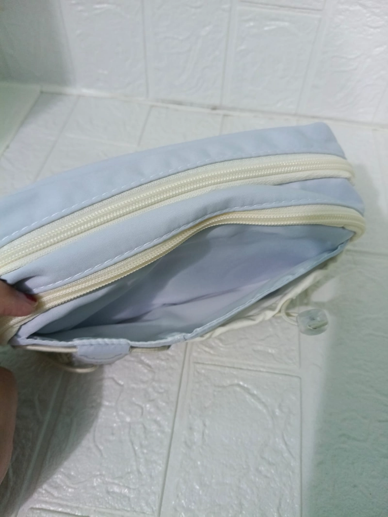 CARTUCHERA CELESTE CON CREMA - 4