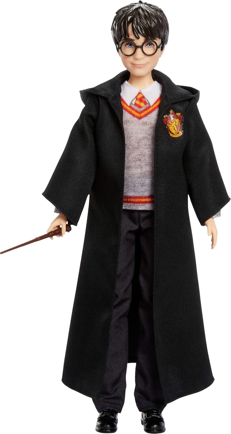 MUÑECO MATTEL HARRY POTTER EN UNIFORME EXTRAÍBLE DE HOGWARTS CON ACCESORIO DE VARITA, INSPIRADO EN LA PELÍCULA - 1