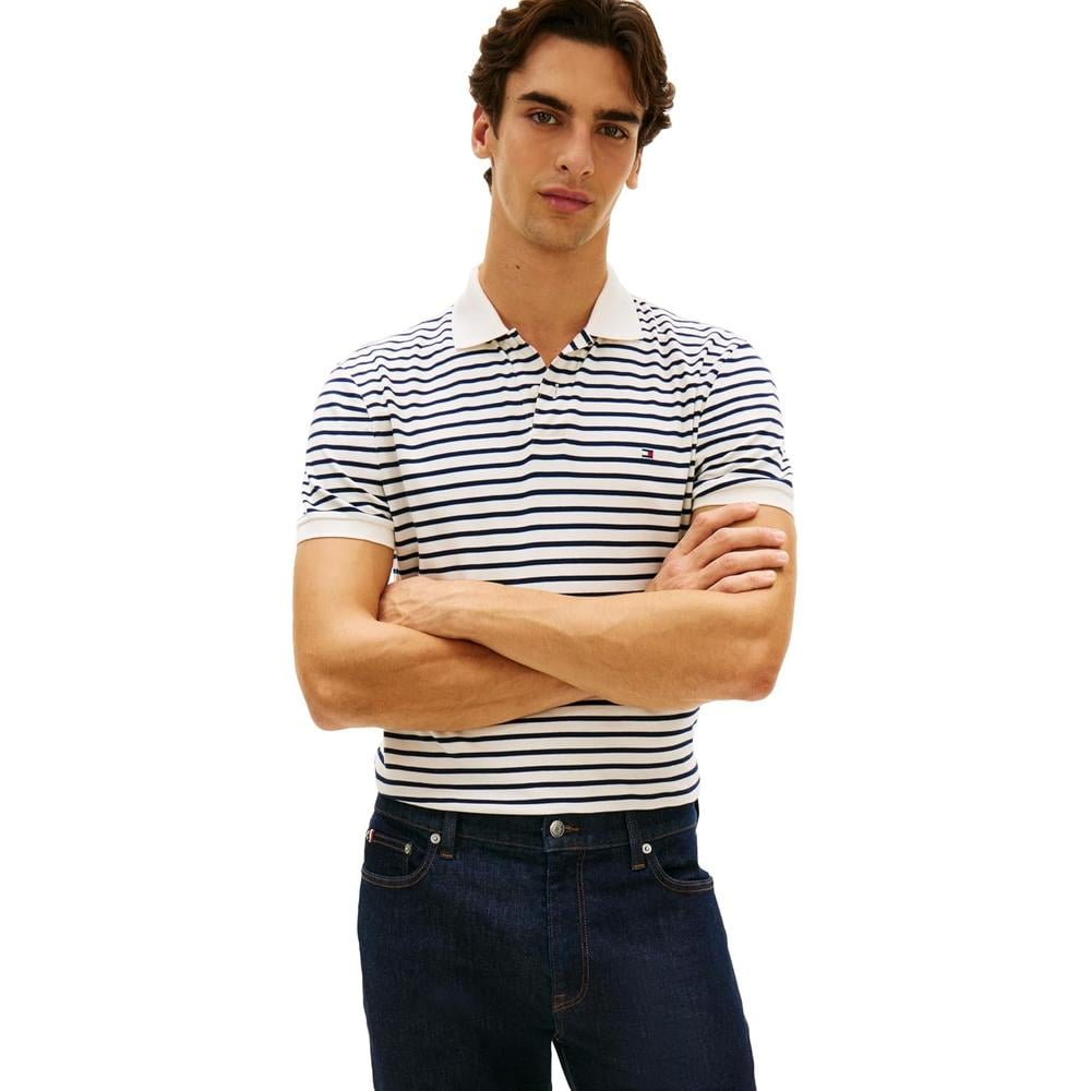 POLO PARA HOMBRE TOMMY HILFIGER REGULAR FIT MANGA CORTA MARFIL PETALO Y AZUL CARBON - 1