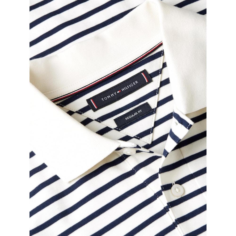 POLO PARA HOMBRE TOMMY HILFIGER REGULAR FIT MANGA CORTA MARFIL PETALO Y AZUL CARBON - 6