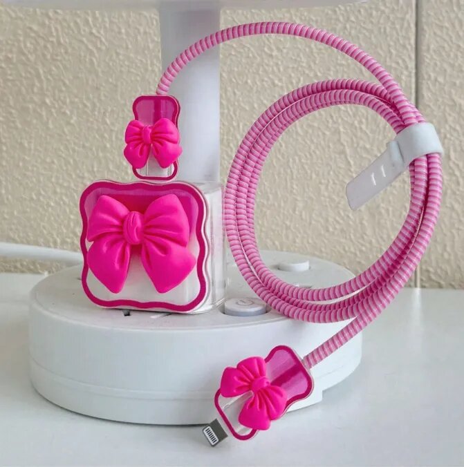 PROTECTOR O CASES DE CARGADOR PARA IPHONE (LAZO FUCSIA) - 1