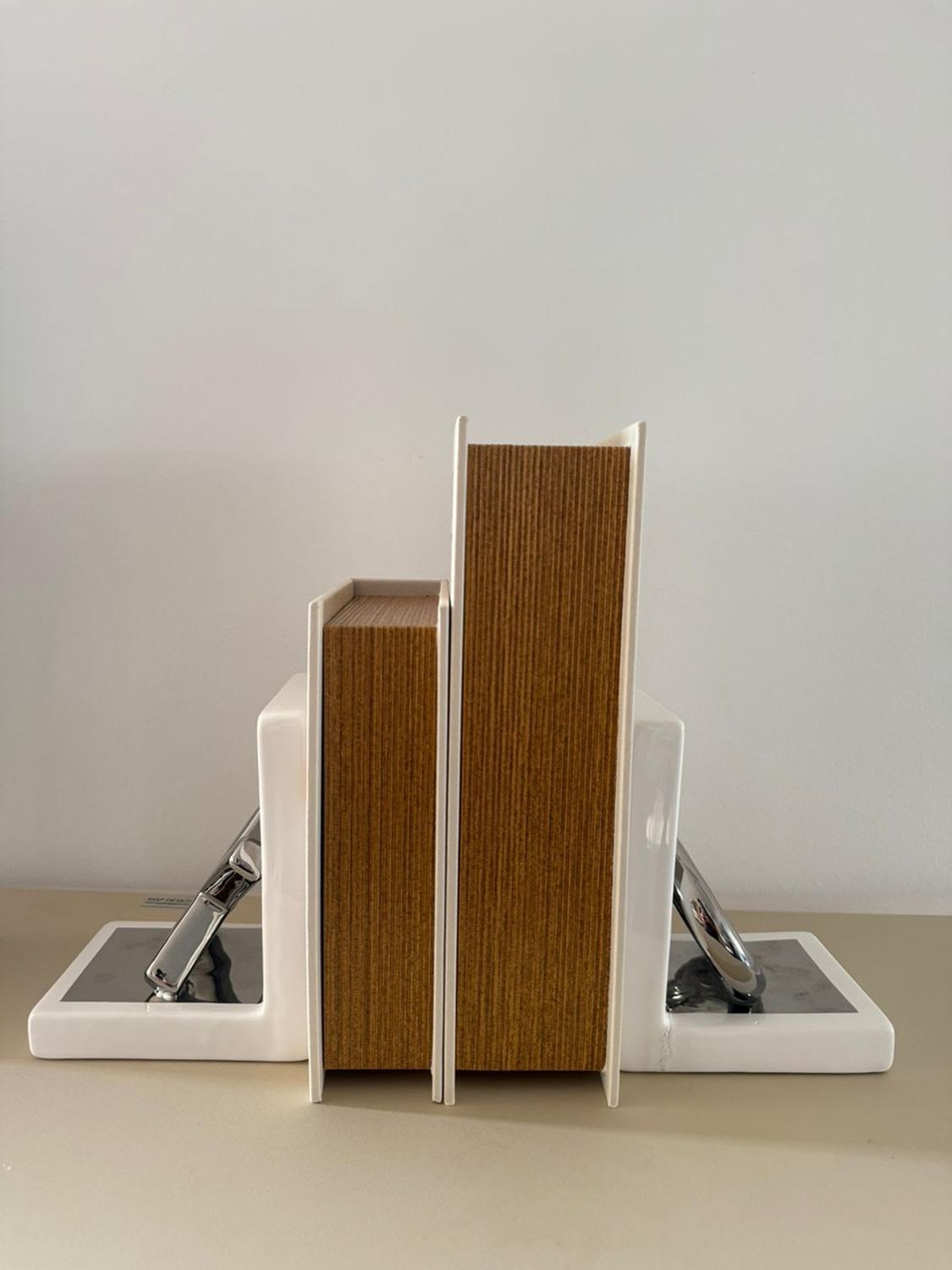 SUJETA LIBROS XO - 2