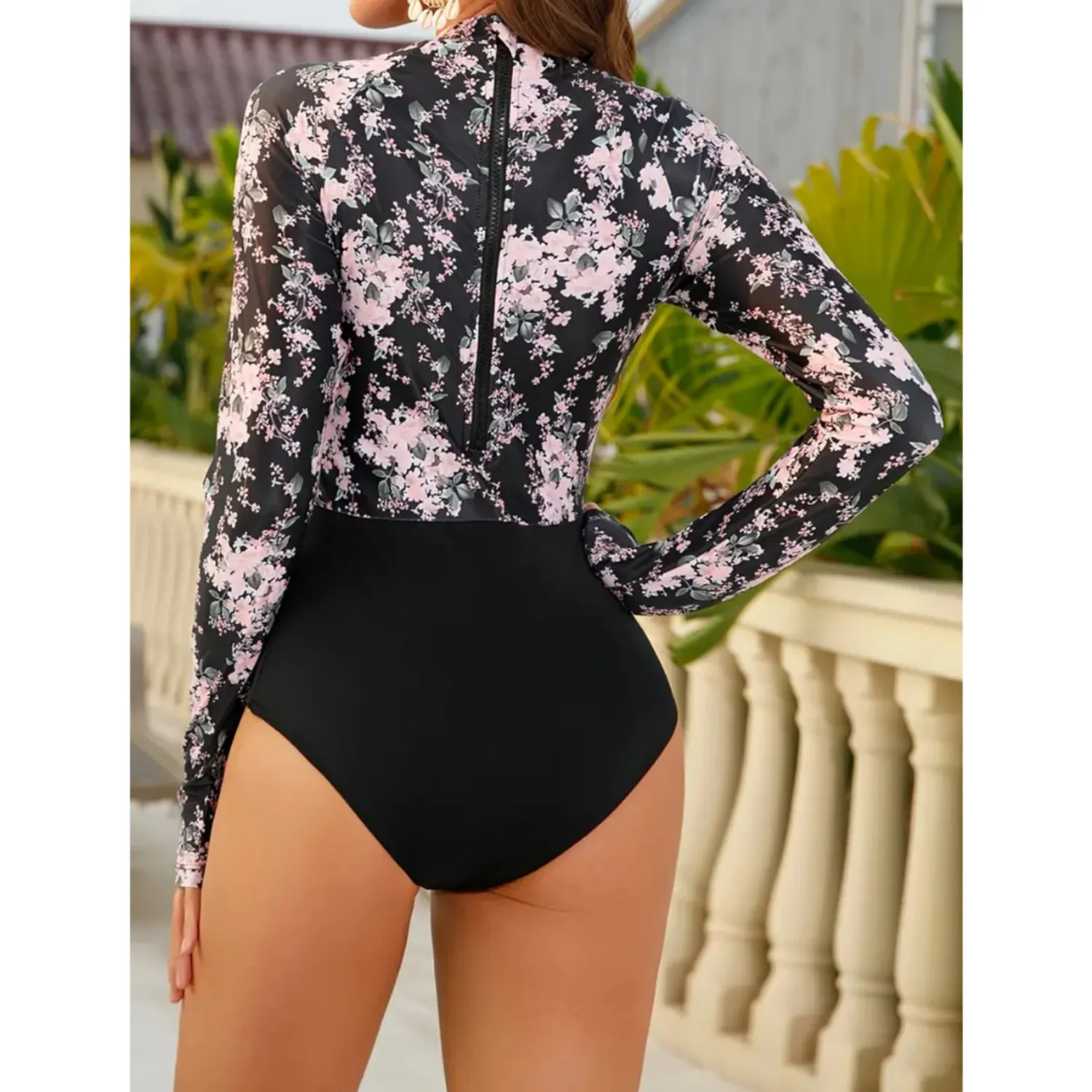 PUERTO MELÓN | TRAJE DE BAÑO MANGA LARGA NEGRO CON COPA Y FORRO INTERNO - ESTAMPADO FLORAL - 2