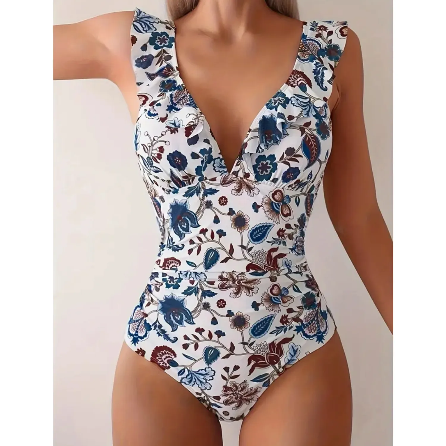 PUERTO MELÓN | TRAJE DE BAÑO ENTERIZO BLANCO FLORAL CON COPA Y FORRO INTERNO - 1