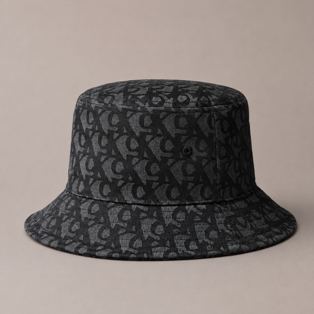GORRA BUCKET CALVIN KLEIN UNISEX ALLOVER LOGO MONOGRAM JACQUARD NEGRO - 1
