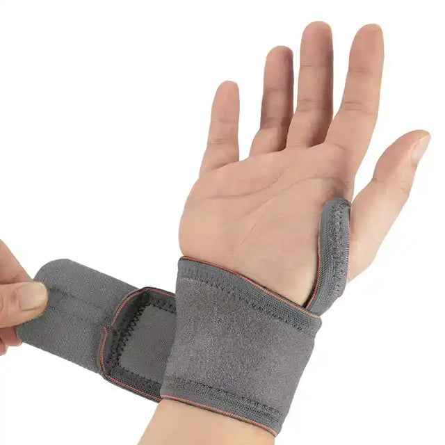 MUÑEQUERA DE POTENCIA Y COMPRESIÓN GRIS CON NARANJA PAR - 1