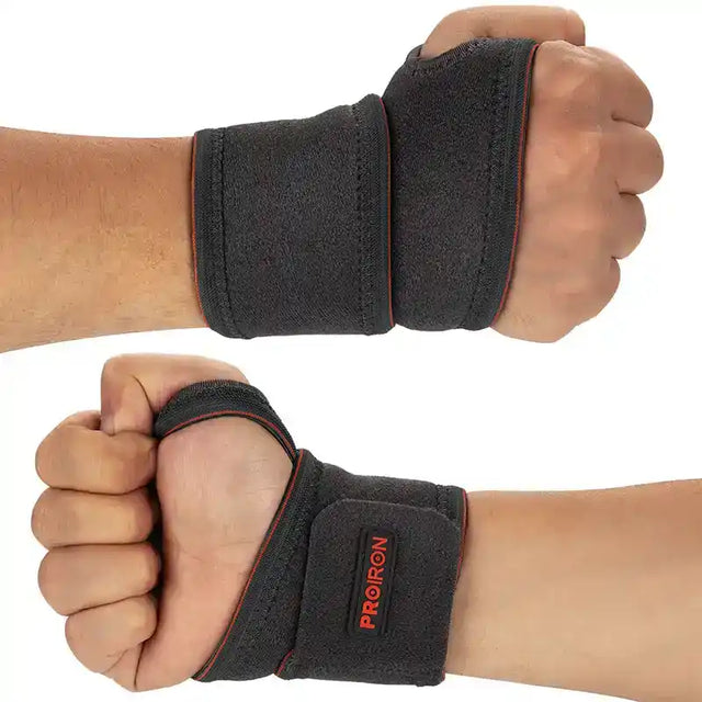 MUÑEQUERA DE POTENCIA Y COMPRESIÓN NEGRO CON NARANJA PAR - 2