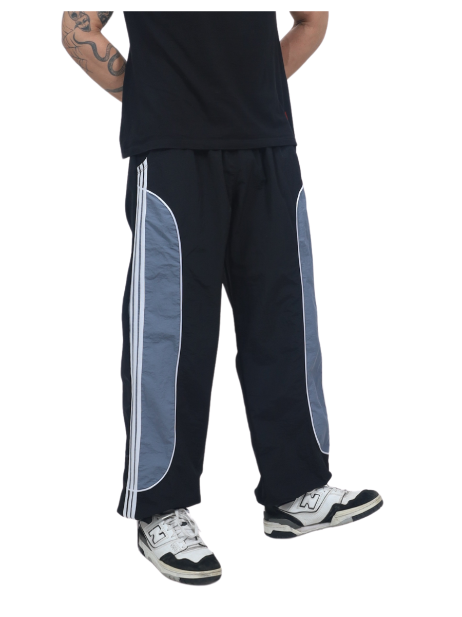 JOGGER POWER TRACK HOMBRE TELA MOJADA - NEGRO - 1