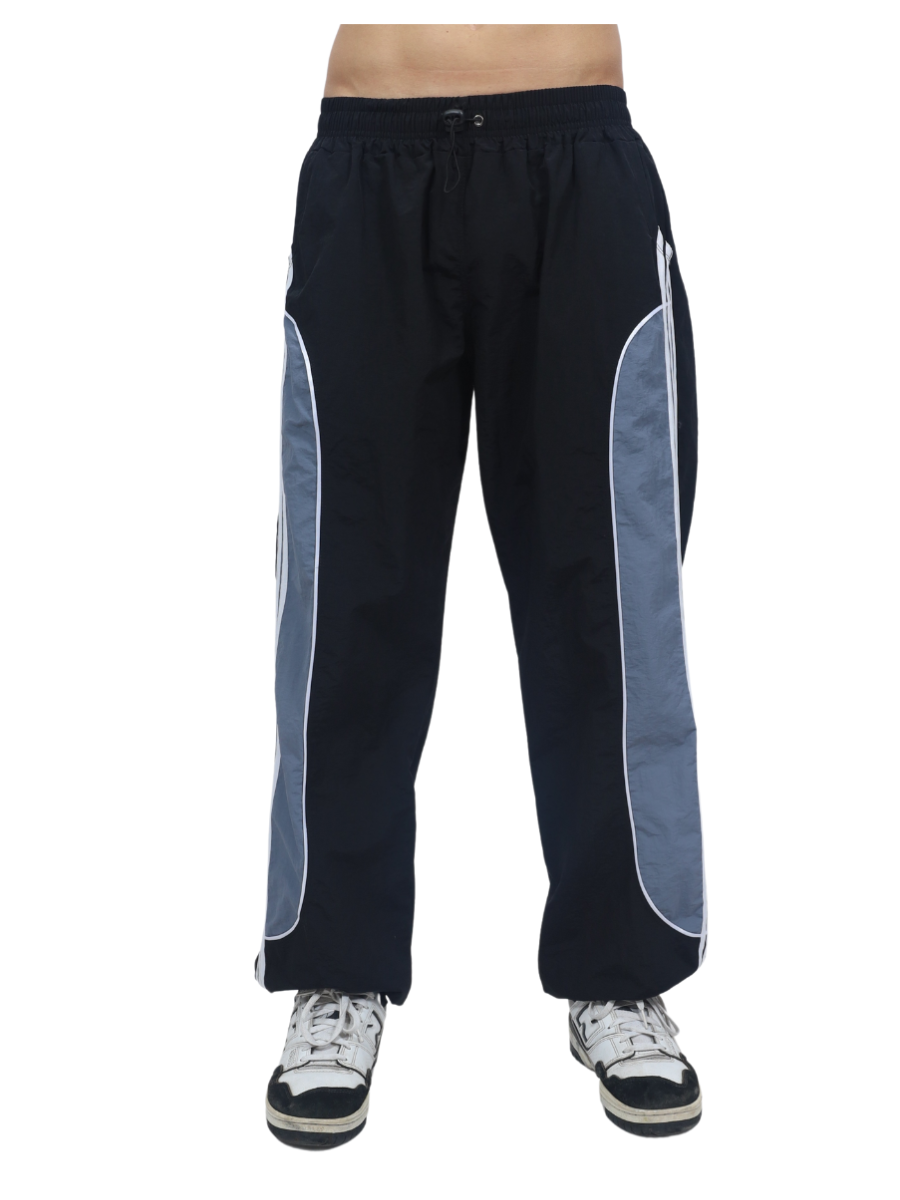 JOGGER POWER TRACK HOMBRE TELA MOJADA - NEGRO - 5