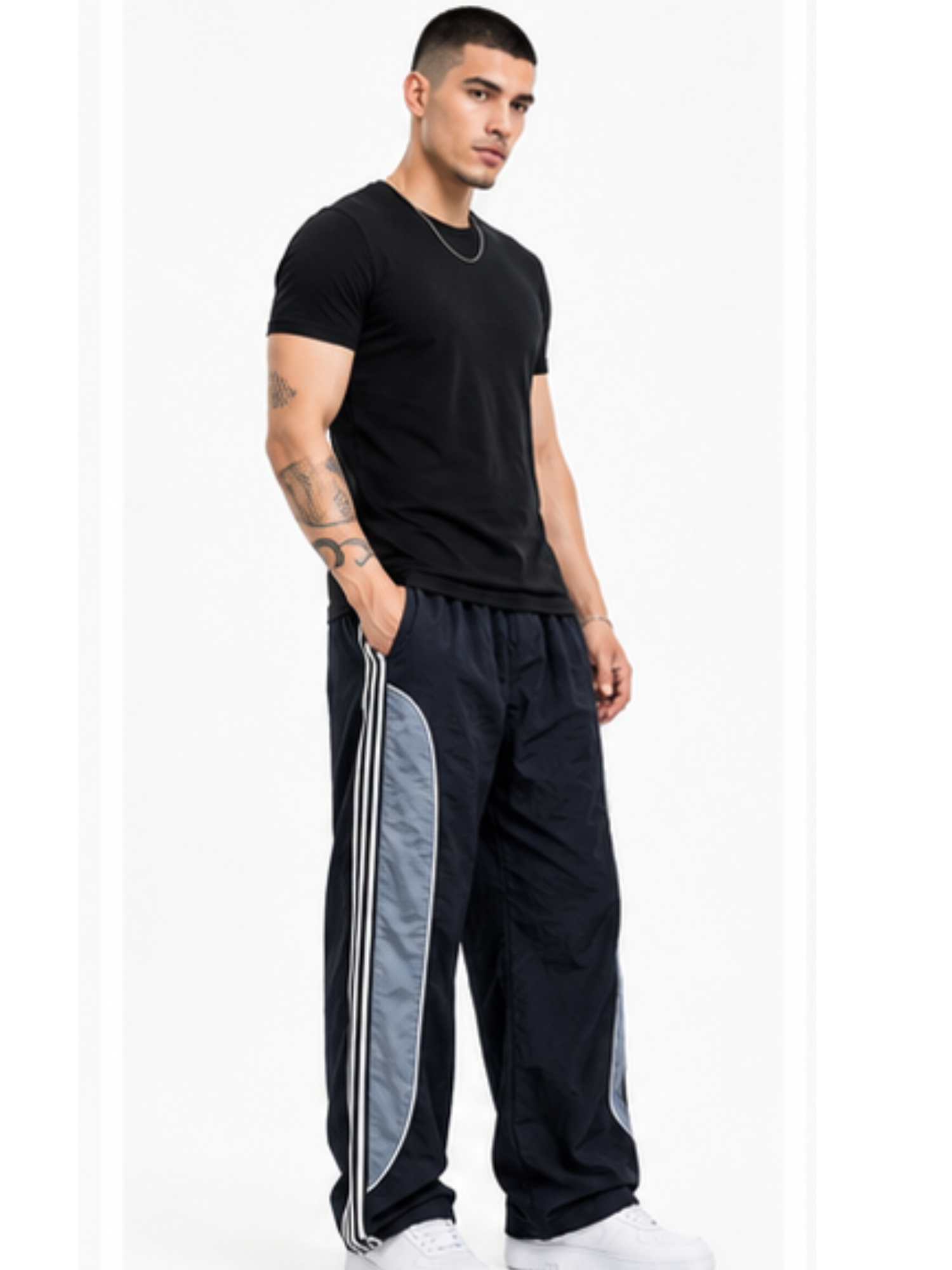 PANTALÓN HOMBRE PAWER TRACK TELA MOJADA NEGRO BAGGY URBANO - 1