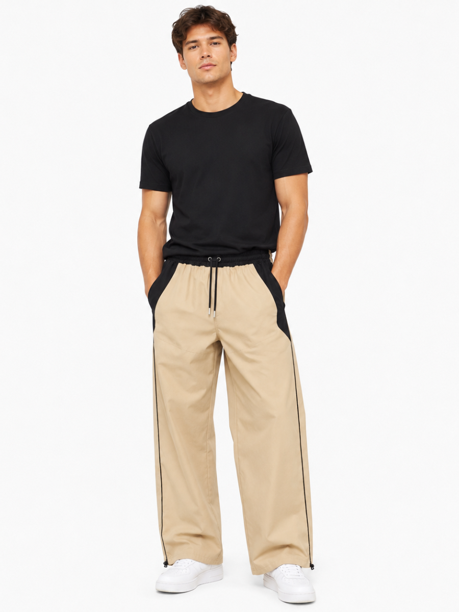 PANTALON BICOLOR TELA NOVA BEIGE HOMBRE CORTE WIDE LEG CINTURA ELASTICA CORDONES AJUSTABLES MODA URBANA CASUAL BOLSILLOS - 1