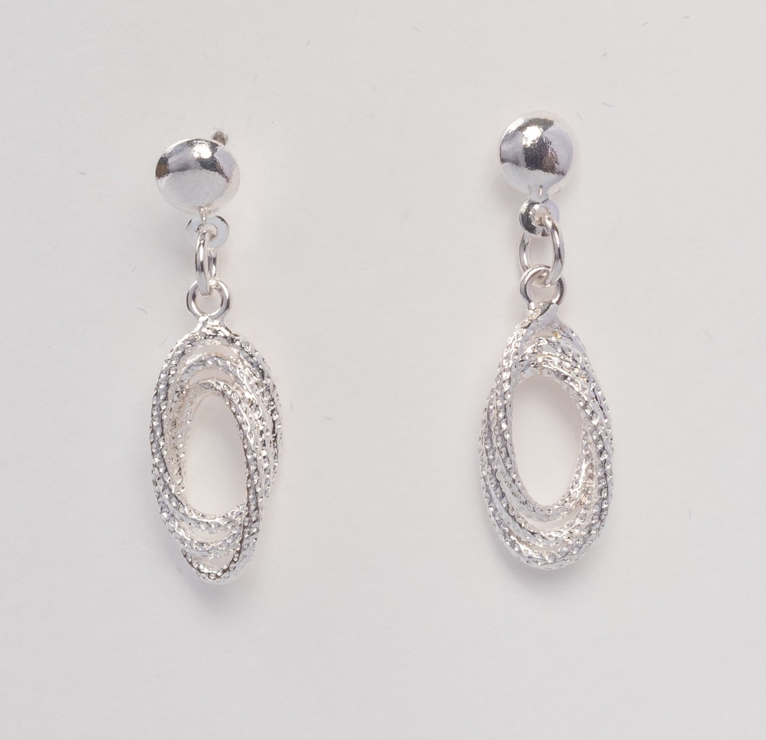 ARETE DE PLATA TORBELLINO OVALADO CON DISEÑO - 1