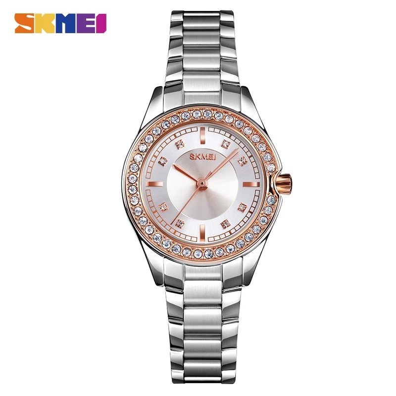 RELOJ SKMEI 1534 PLATEADO DETALLES DORADOS CORREA ACERO PARA MUJER - 1