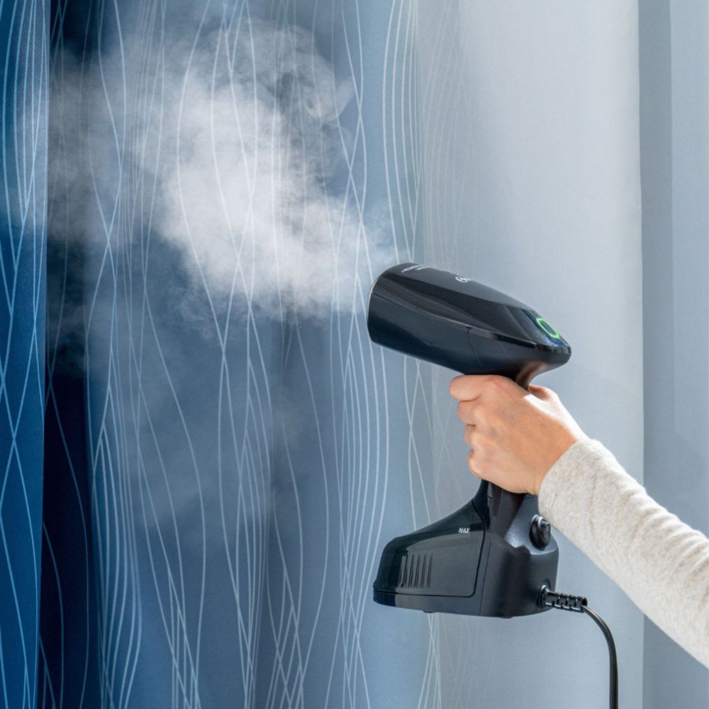 VAPORIZADOR DE TELAS PORTÁTIL OSTER GCSTES 101 - 4