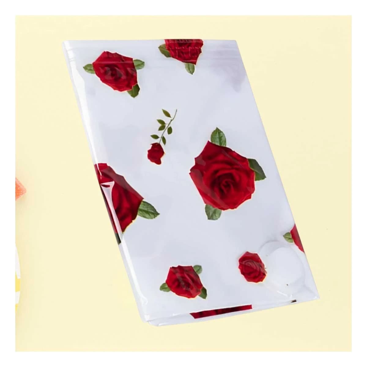 BOLSA AL VACIO CON ESTAMPADO DE ROSAS ROJAS 80X130CM TRANSPARENTE Y+POST IT - 1