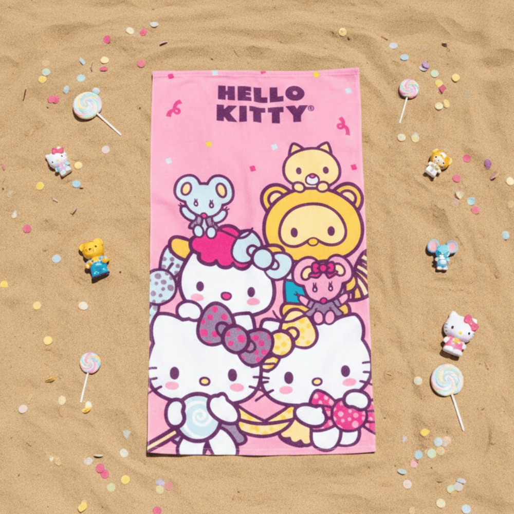 TOALLA PARA PLAYA HELLO KITTY ROSA Y AMIGOS 140X70CM - 1