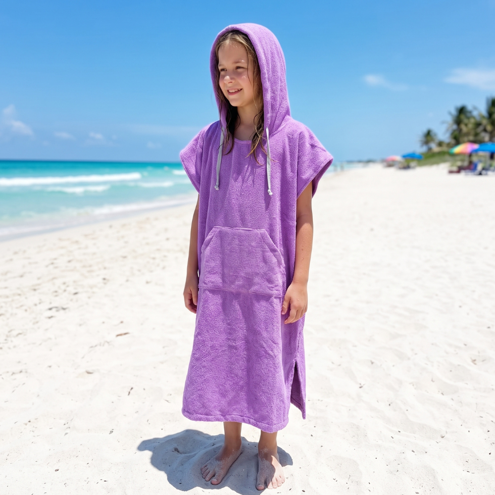 TOALLA PONCHO CAMBIADOR LILA PARA NIÑOS DE 6 A 11 AÑOS - 1