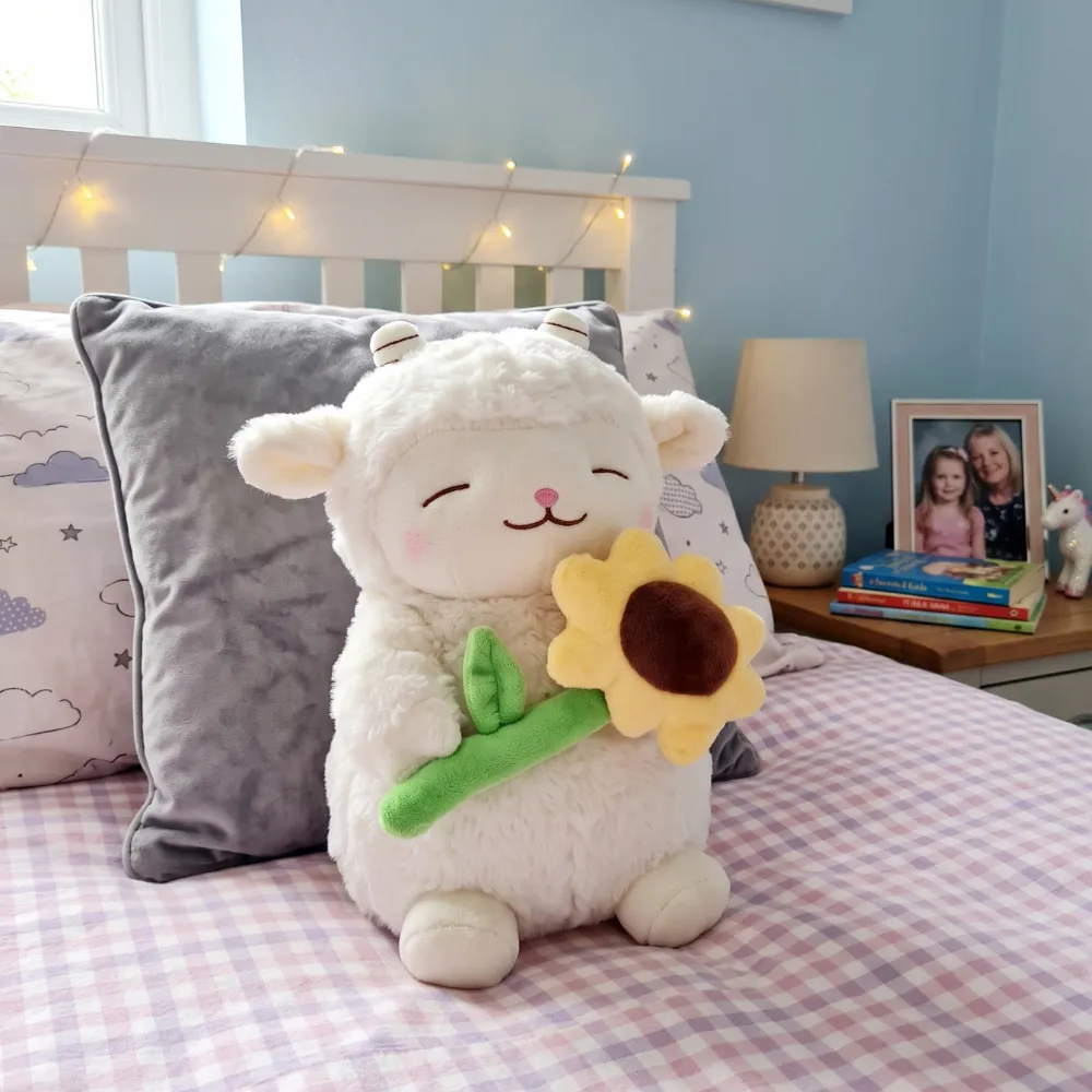 PELUCHE OVEJA CON FLOR 25 CM - 1