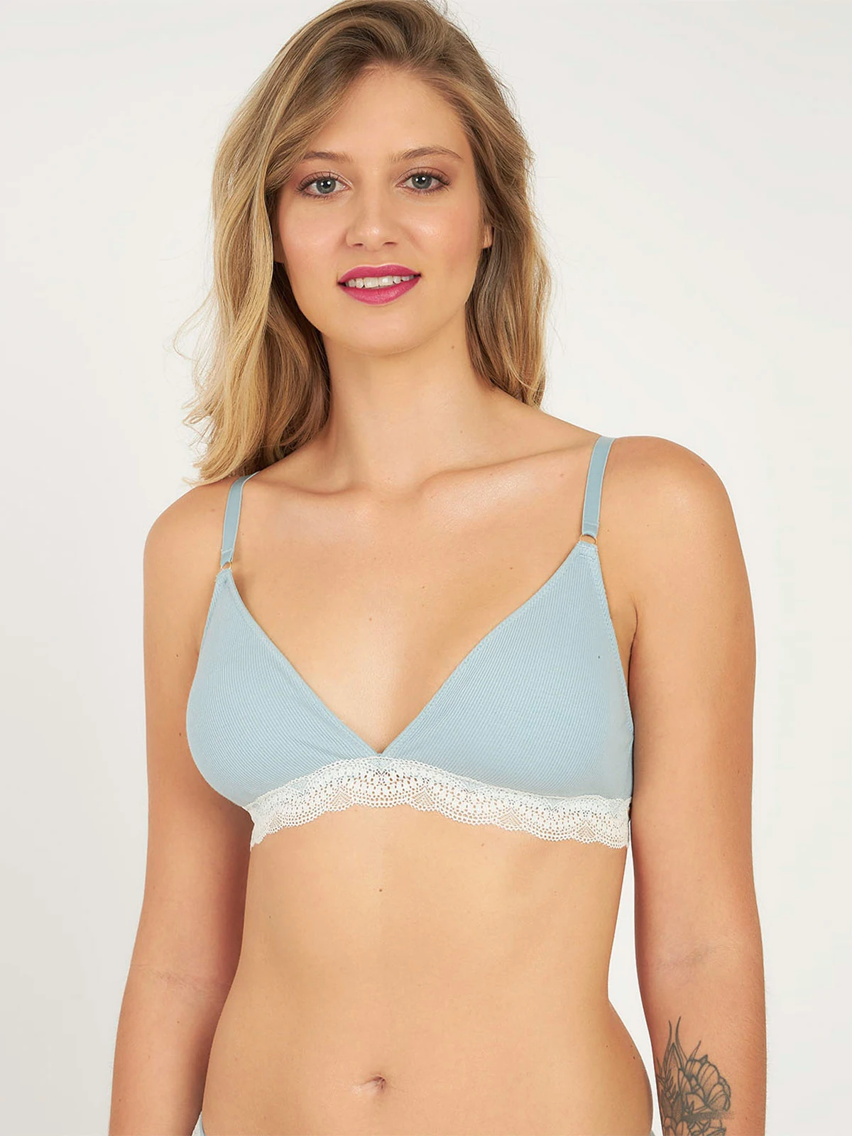 SOSTÉN MUJER KAYSER - 2