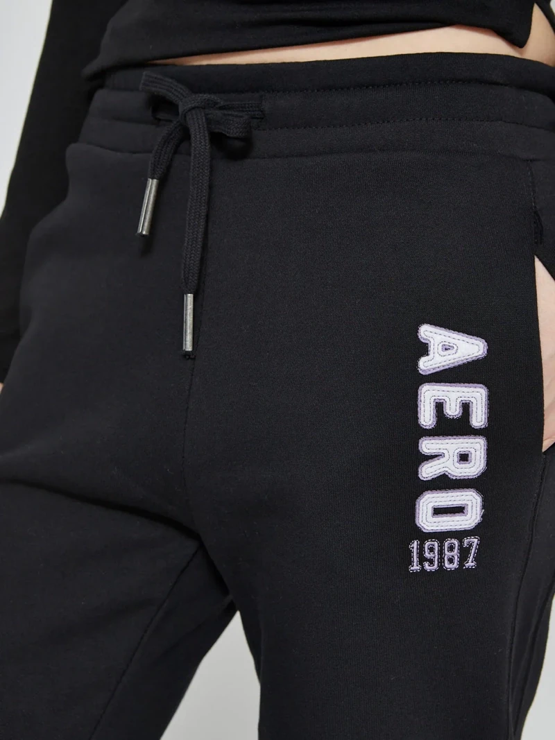 PANTALÓN DE BUZO MUJER AERO MEL - 4