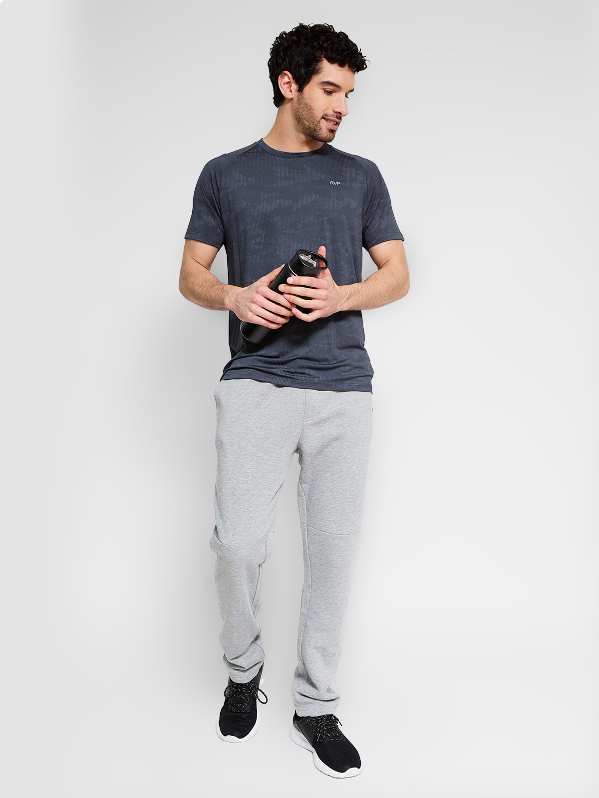 PANTALÓN BUZO HOMBRE REVUP SKINNY - 1