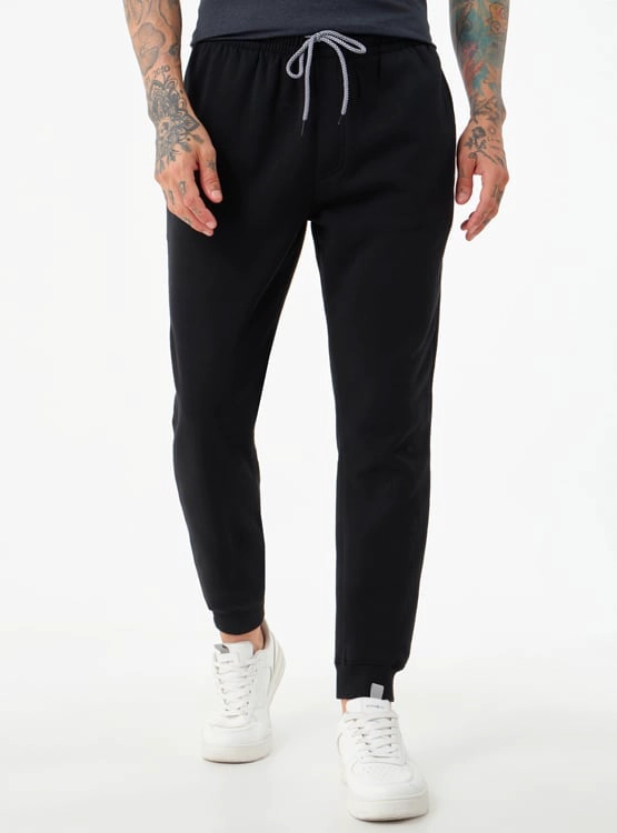 PANTALÓN BUZO HOMBRE REVUP PUNO HOM - 1