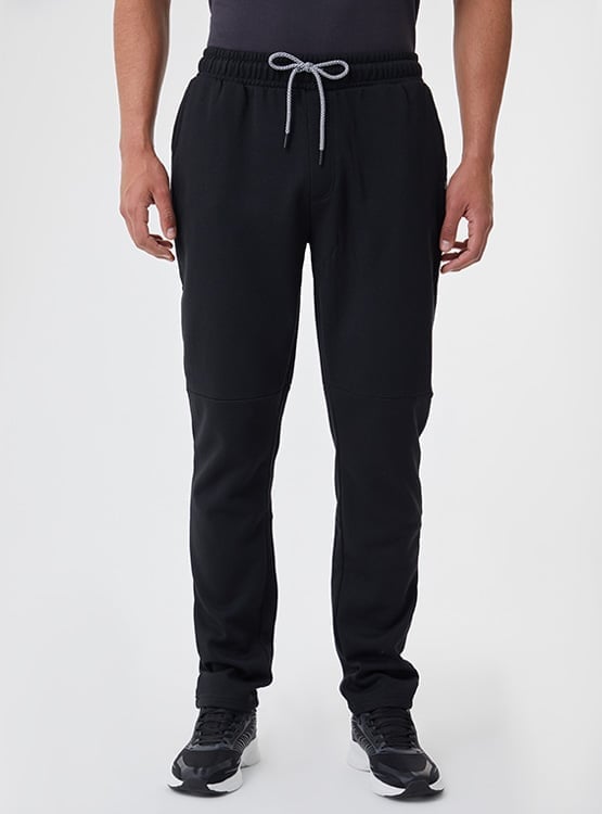 PANTALÓN BUZO HOMBRE REVUP SKINNY - 1