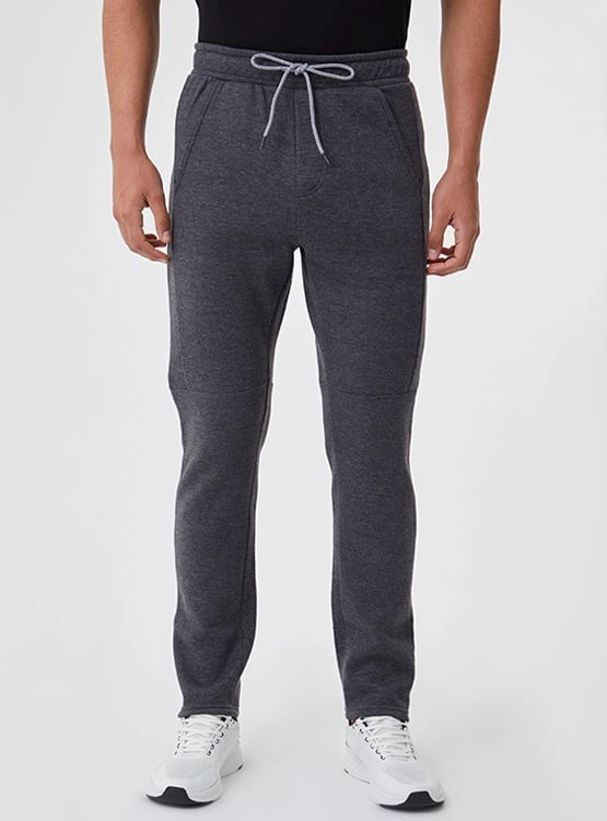 PANTALÓN DE BUZO SKINNY HOMBRE REVUP - 1