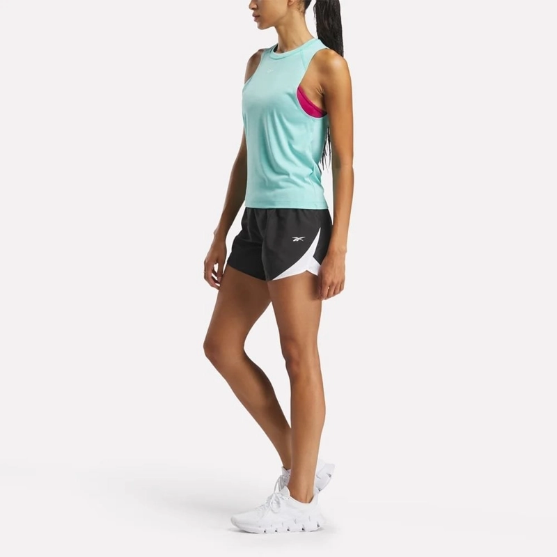 POLO MUJER REEBOK 100215075 CELESTE - 3
