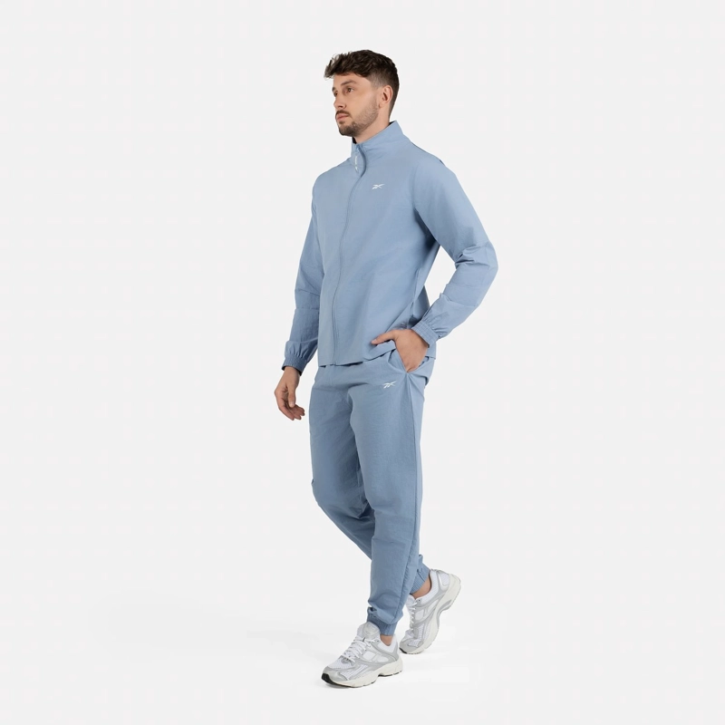 BUZO CONJUNTO HOMBRE REEBOK CLARISENZIL TRACKSUIT CELESTE - 1