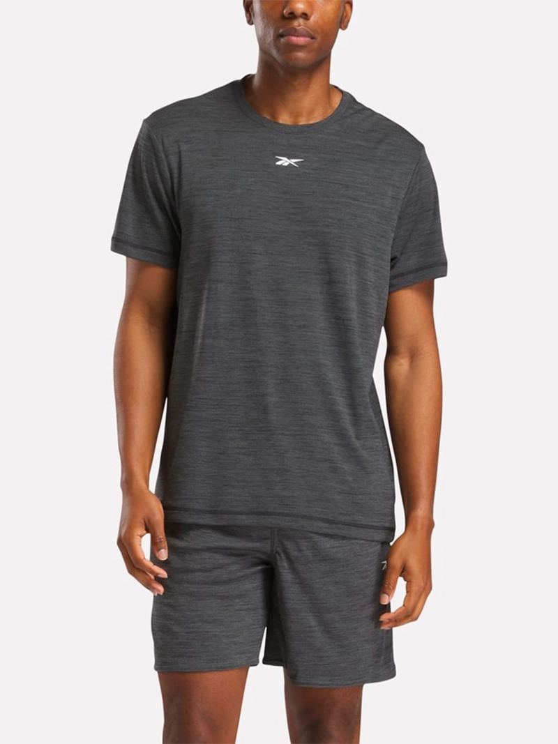 POLO HOMBRE REEBOK ID TRAIN MELANGE TECH TEE - 1