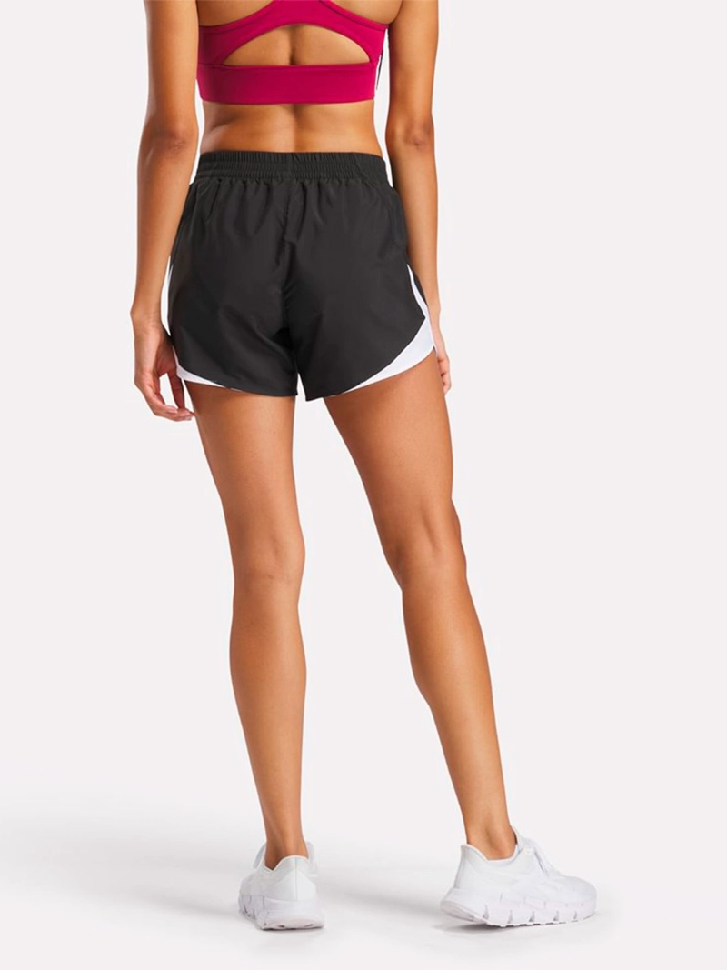 SHORT MUJER REEBOK ID TRAIN WOVEN - 2