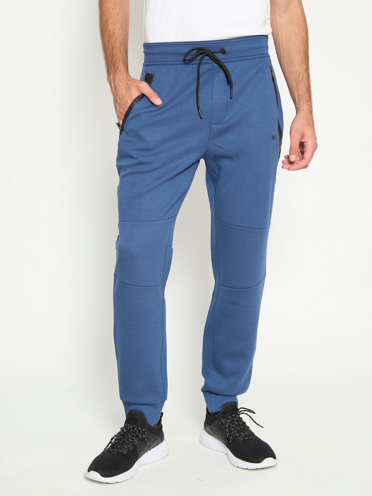 PANTALÓN BUZO HOMBRE REVUP CORTES - 1